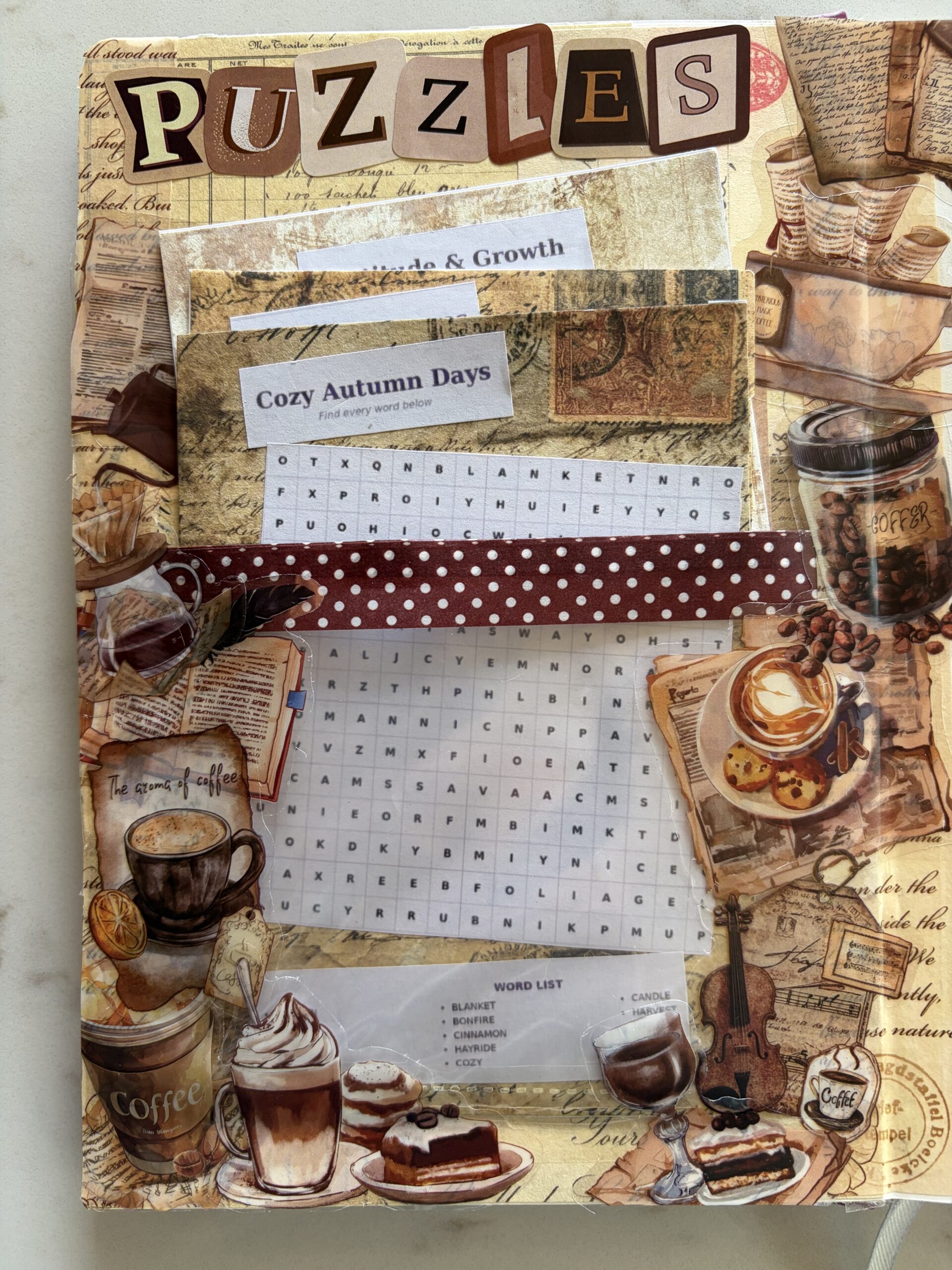 Puzzle page and pocket in a junk journal spread with word searches