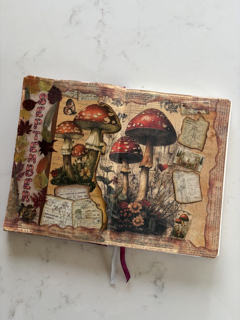 September spread page inside life Junk Journal with autumnal toadstools and botanical ephemera