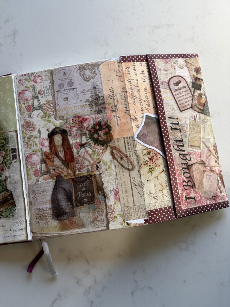 Example envelope inside a junk journal spread with ephemera added to the envelope
