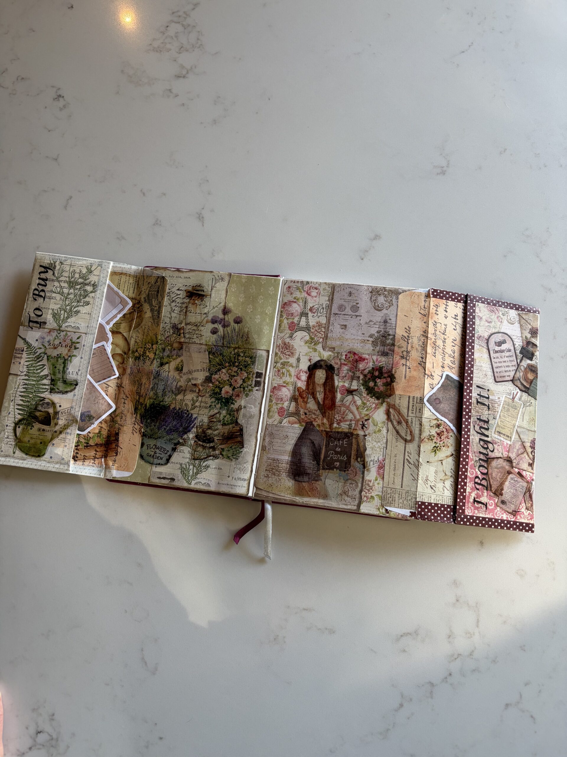 Example of two envelopes inside a junk journal spread opened right up to show the full spread
