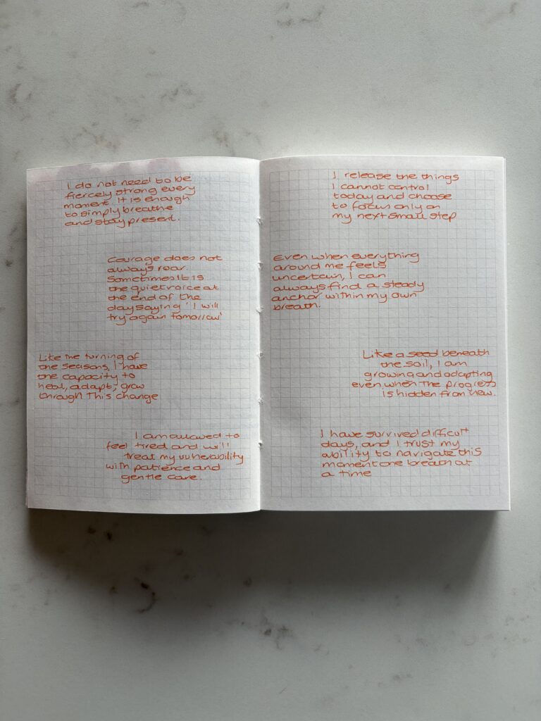 Writing inside a junk journal first before adding ephemera