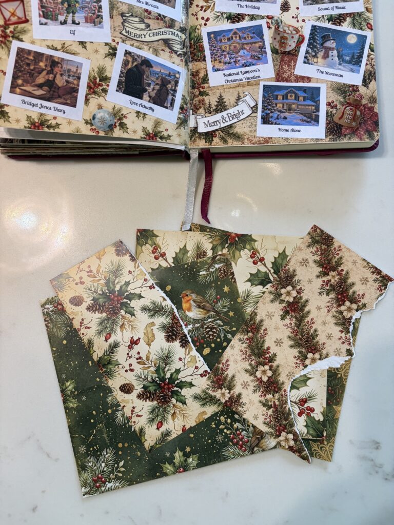 Part of a 12 Days of Christmas Movies junk journal spread with movies as polaroids shown across two pages of an a5 junk journal, plus christmas paper ephemera shown